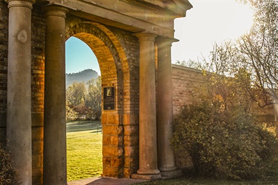 Picture of BHSU Arches or the remains of Normal Hall, mountain in the background