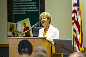 Picture of BHSU President Nichols delivering a speech behind a podium