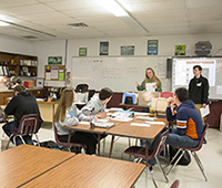 Picture of students working on the SDSMG