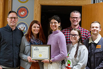 Students from the BHSU Arts Club receive the award for Community Service