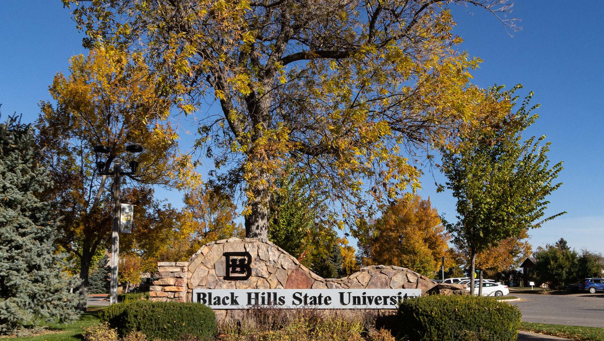 An engraving that reads Black Hills State University on a stone background.