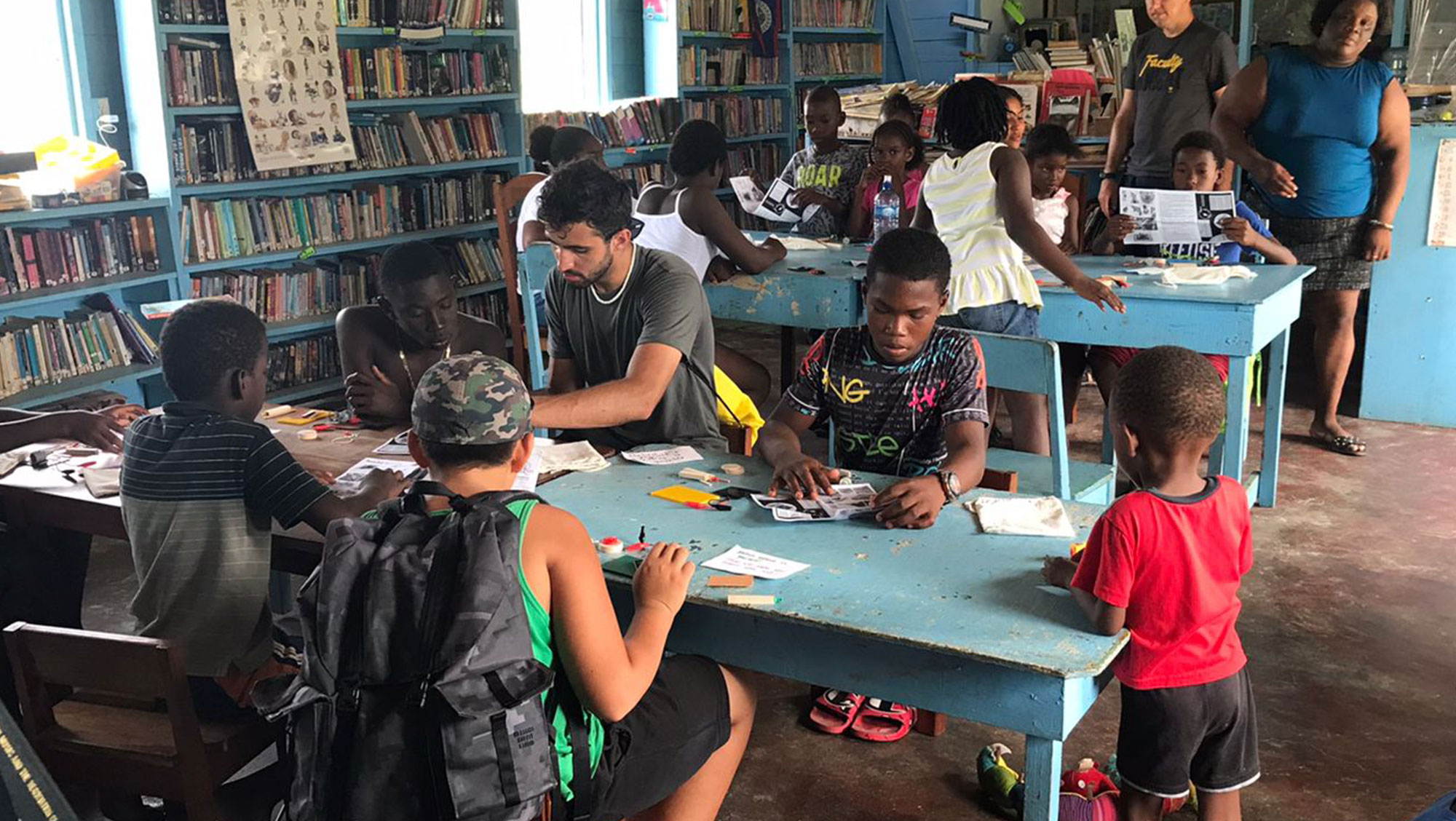 BHSU Senior Micah Ortiz teaches a class to students at a local library in Belize