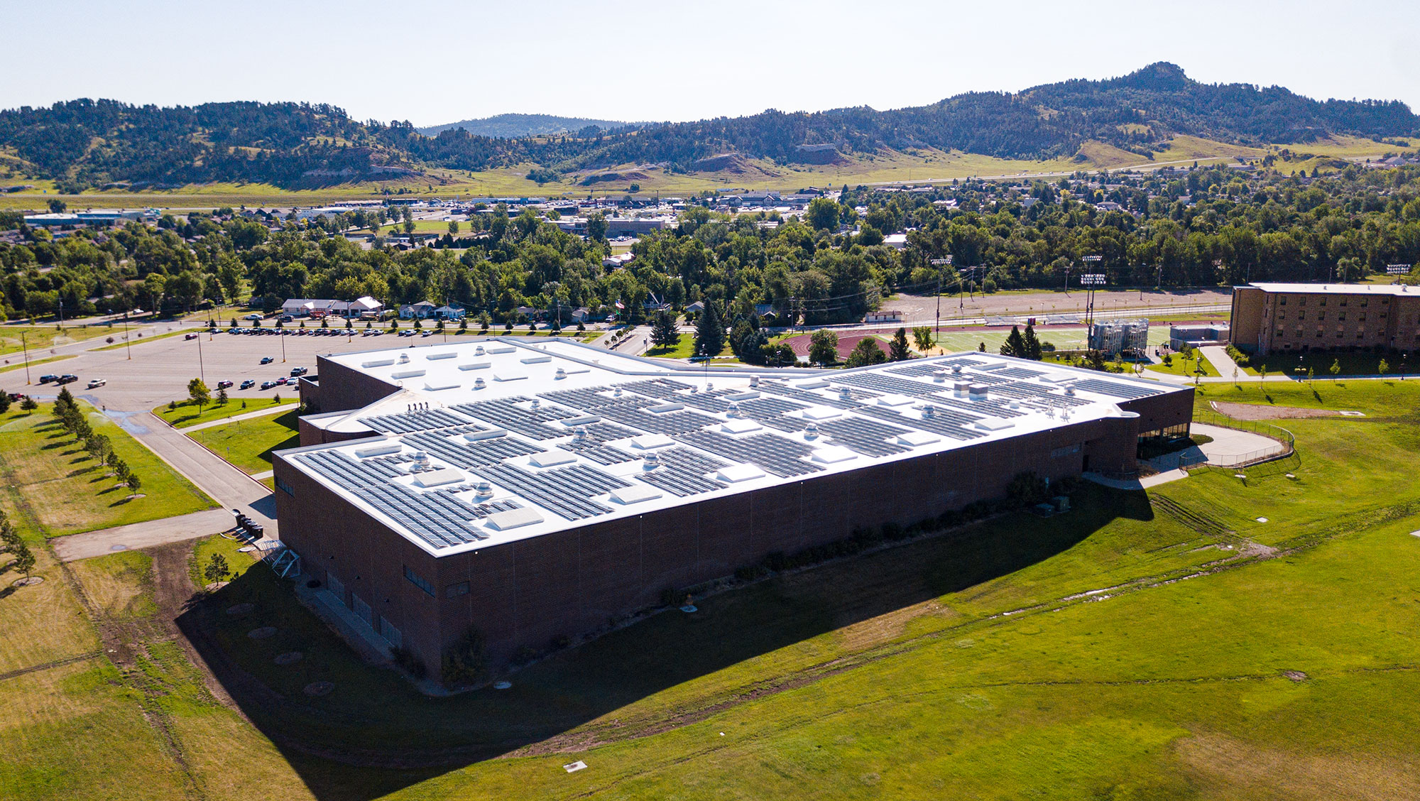 Image of solar panels on top of the Young Center on the BHSU campus.