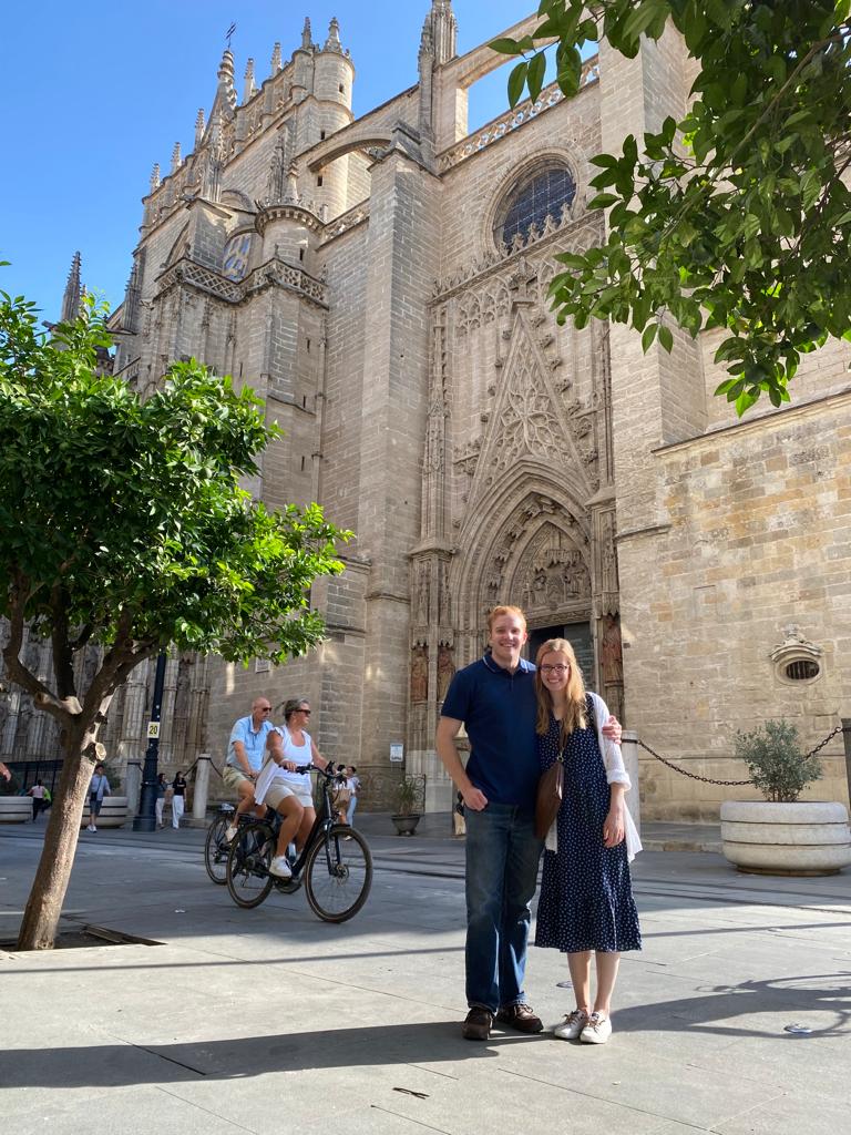 Kelsey Sundberg and Matthias Steeves pose for a photo in Spain.