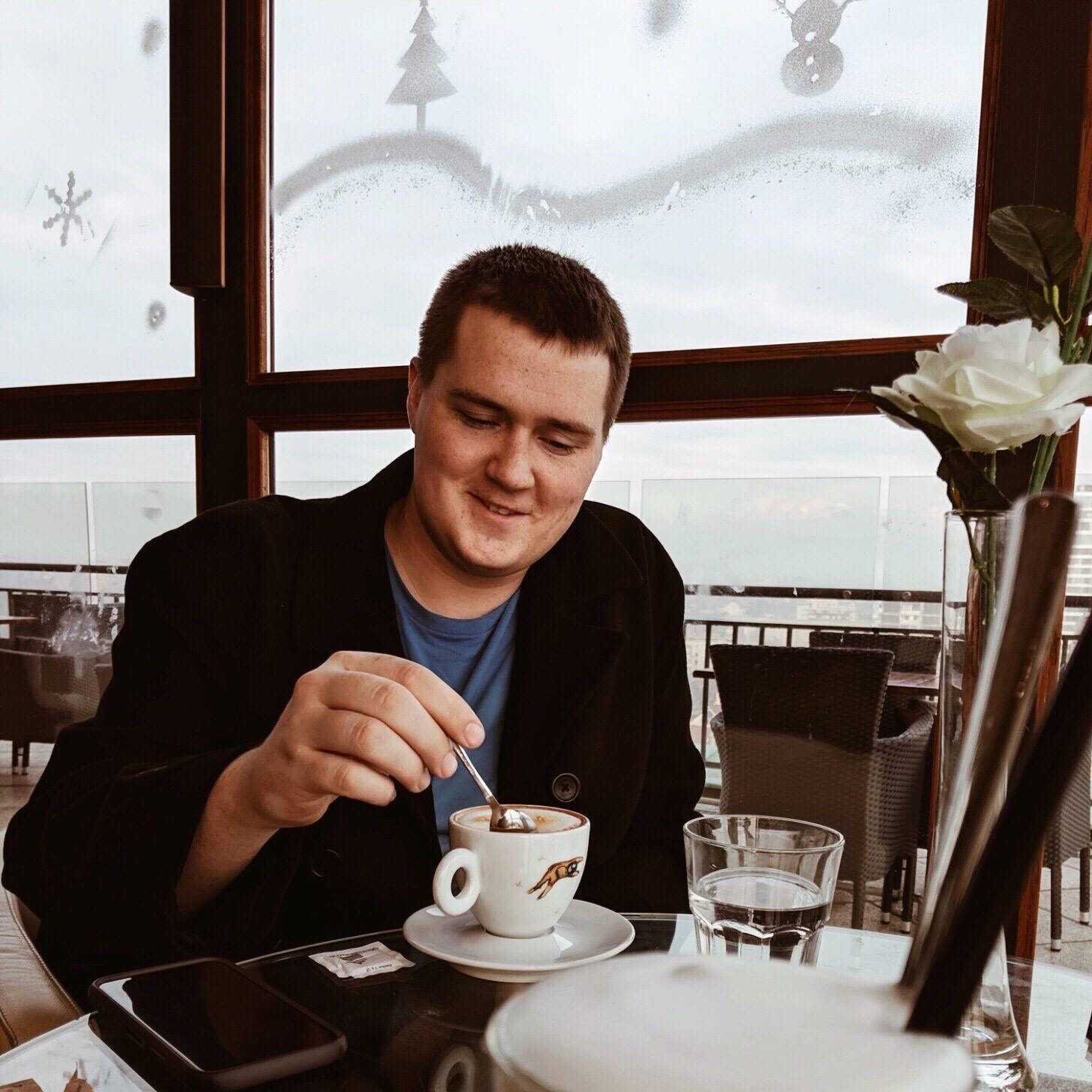 Justin Logue drinking tea in Slovenia.