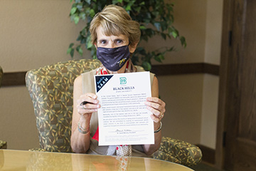 BHSU President Laurie S. Nichols signs a Presidential Proclamation for Sexual Assault Awareness Month (SAAM). 