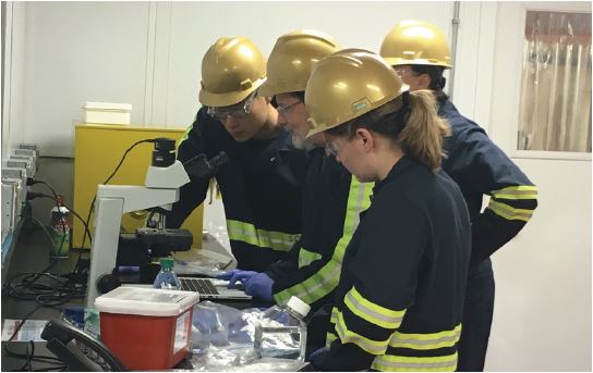 Four students conduct research at the Sanford Underground Research Facility.