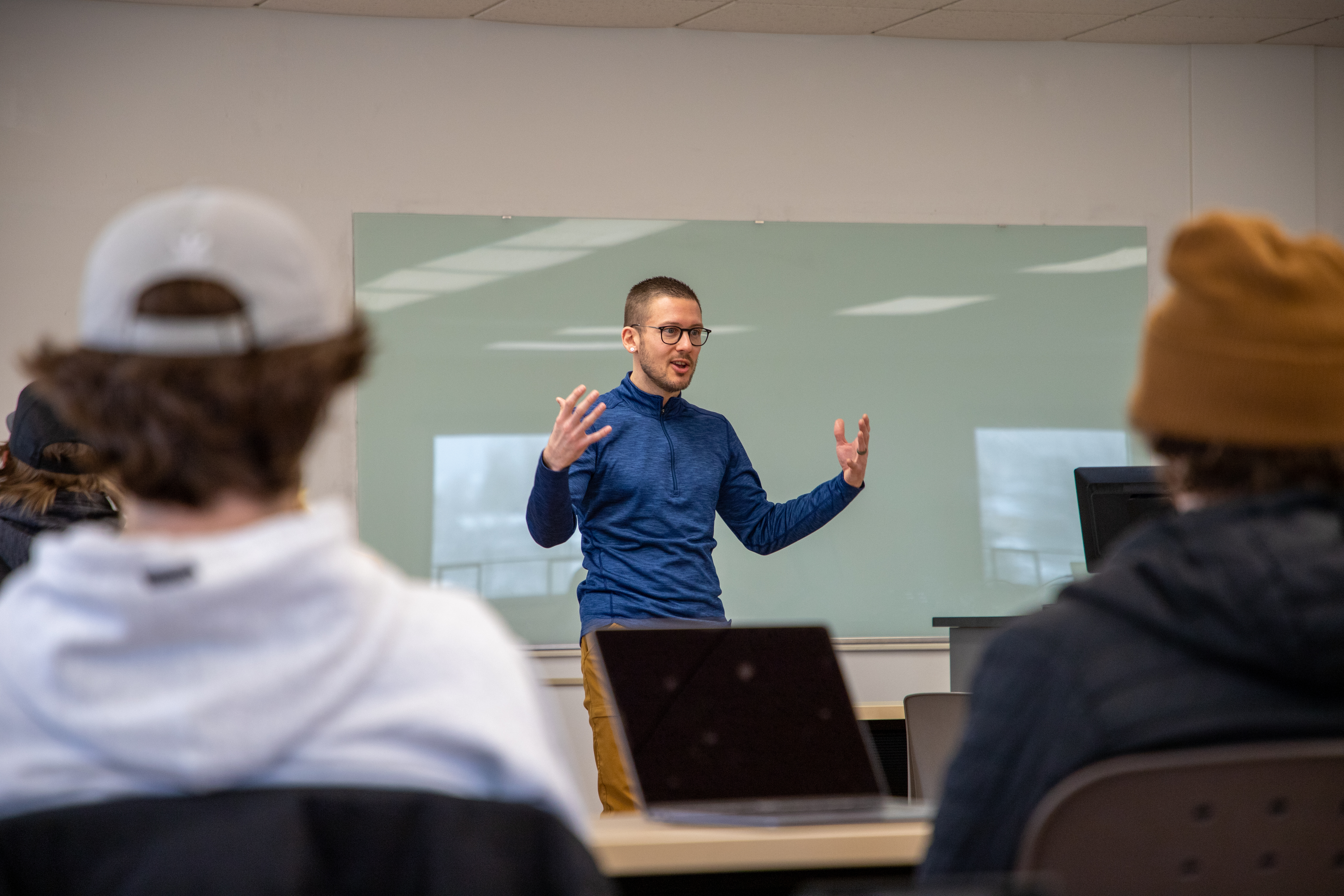 Dr. Trenton Ellis lectures in class.