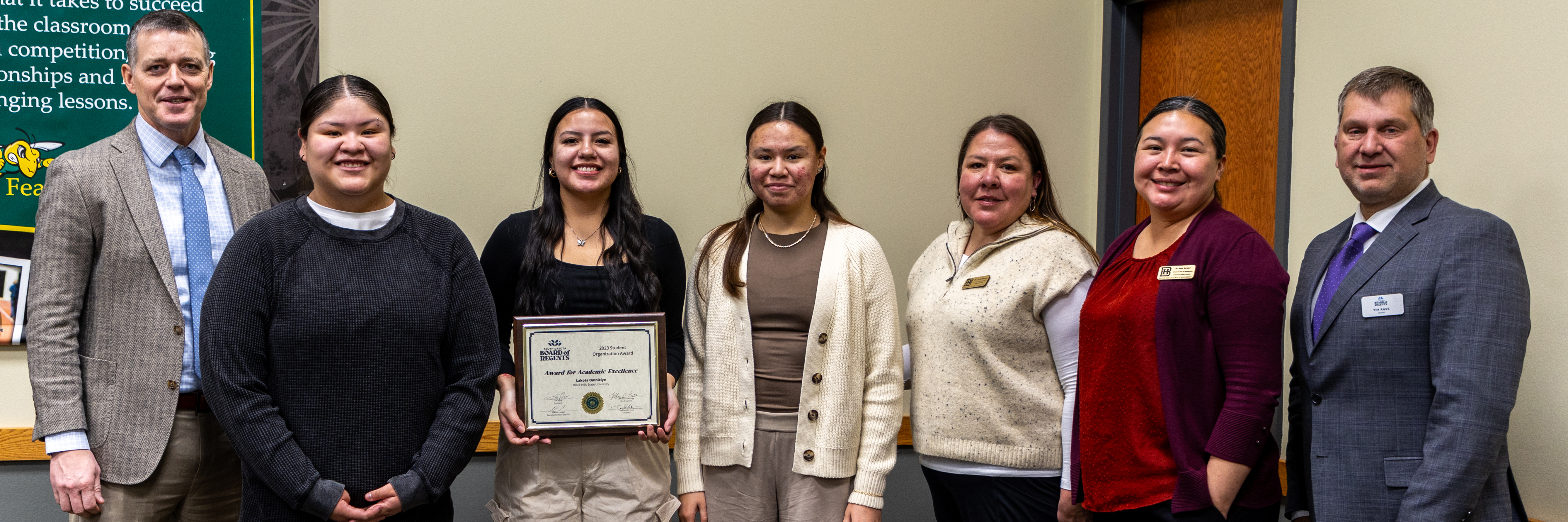 Lakota Omniciye members pose for a photo with SDBOR members
