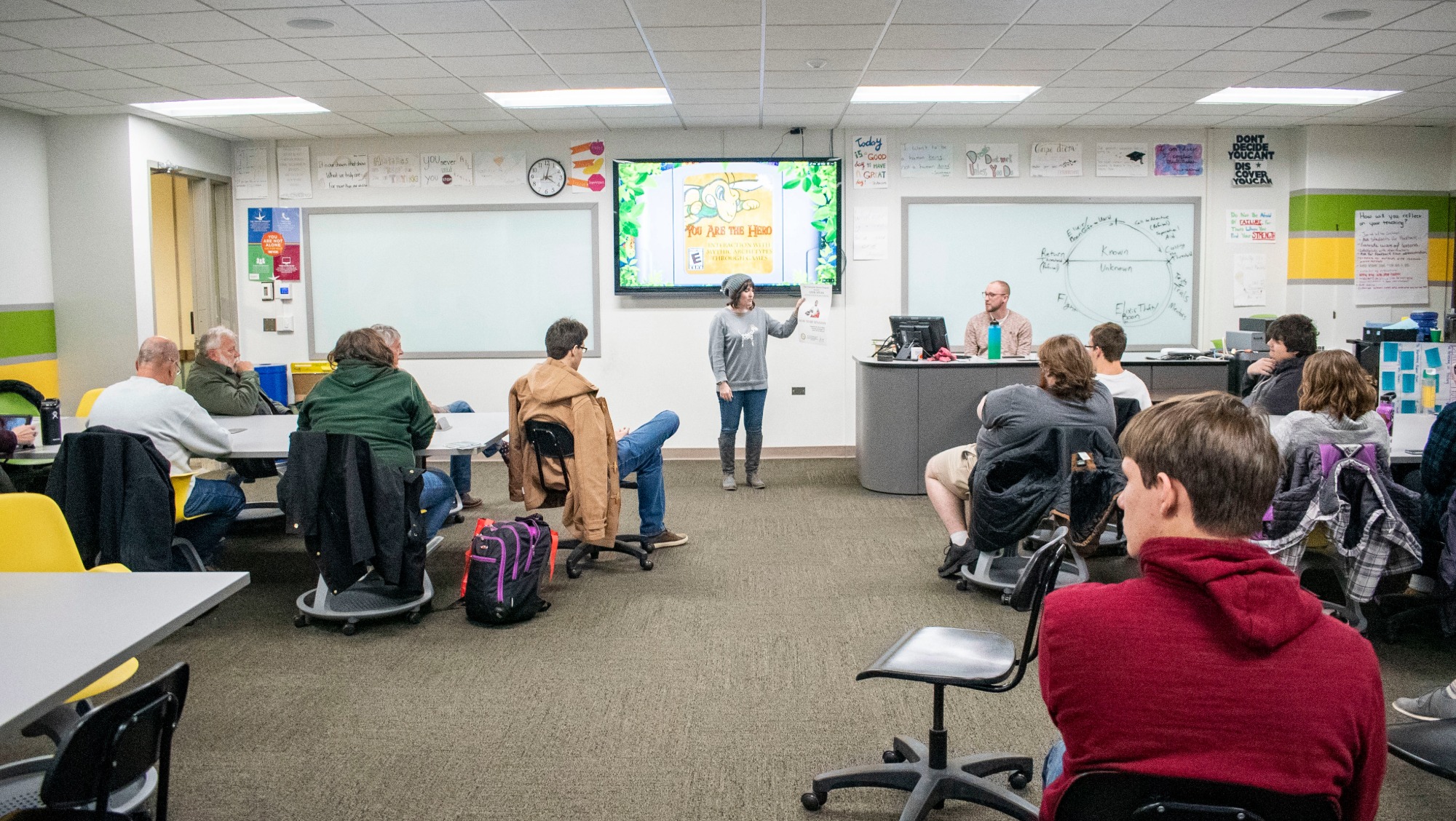 Attendees sit in a classroom and listen to a speaker during a BHSU Geek Speak session.