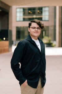 Graduate Cristian Fierro poses for the camera